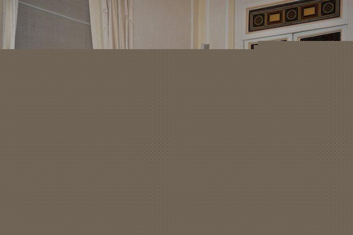 Ingrandisci la foto